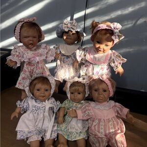 Set of Six vintage porcelain baby dolls collectibles or for display.